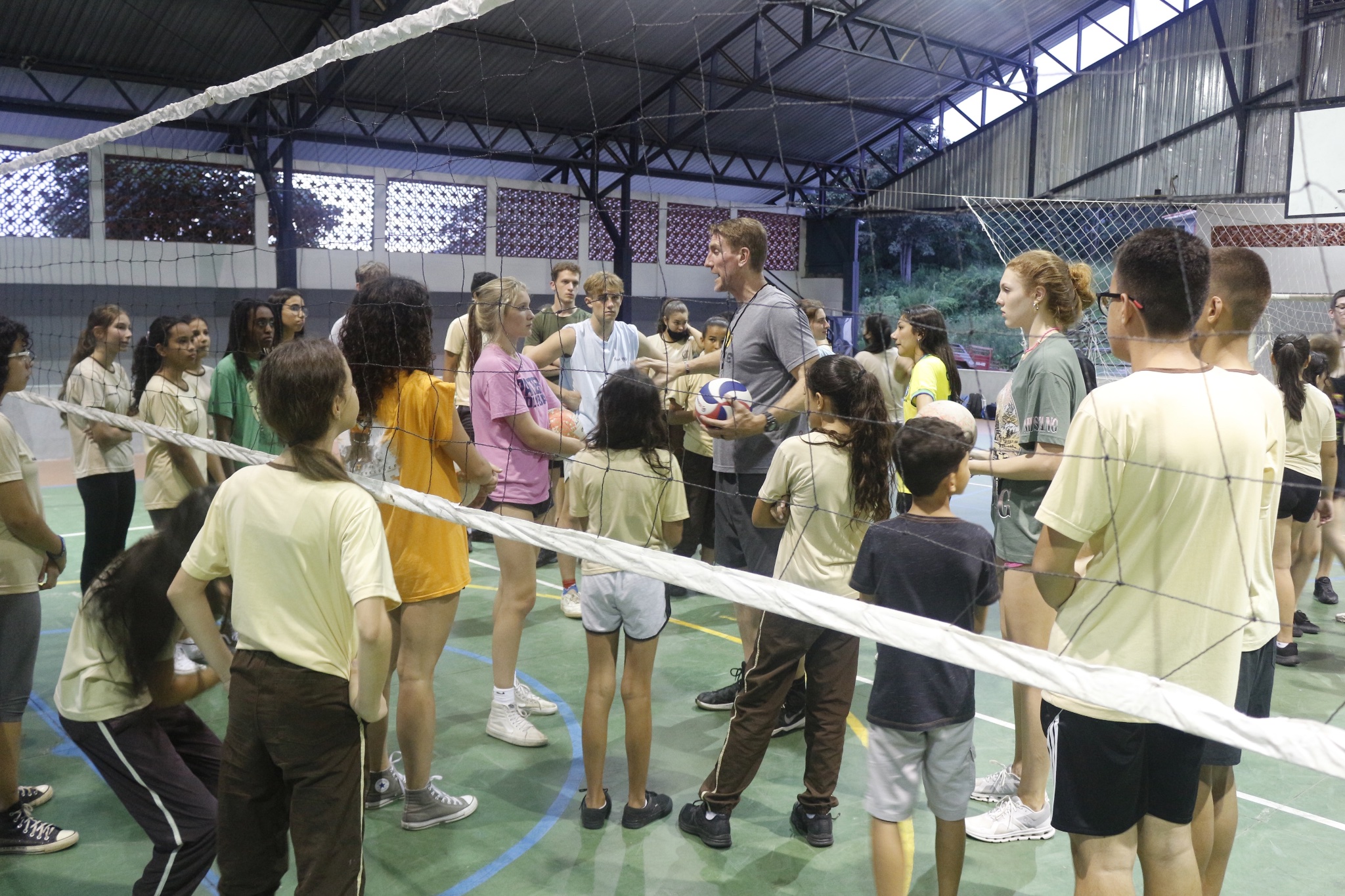 Coaching youth at the net
